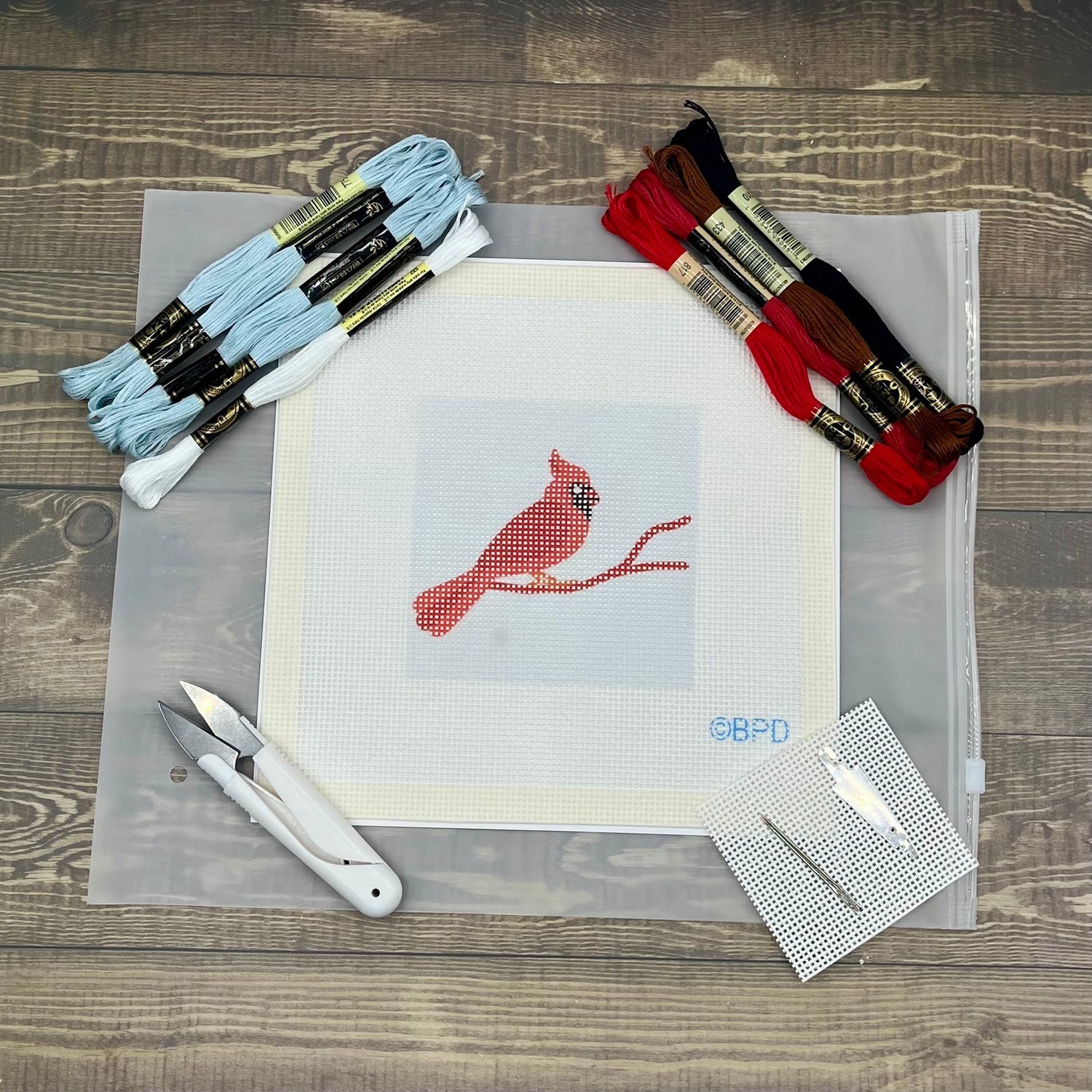Cardinal Needlepoint Kit (red beak on light blue) Embroidery/Cross Stitch Supplies Blue Poppy Designs