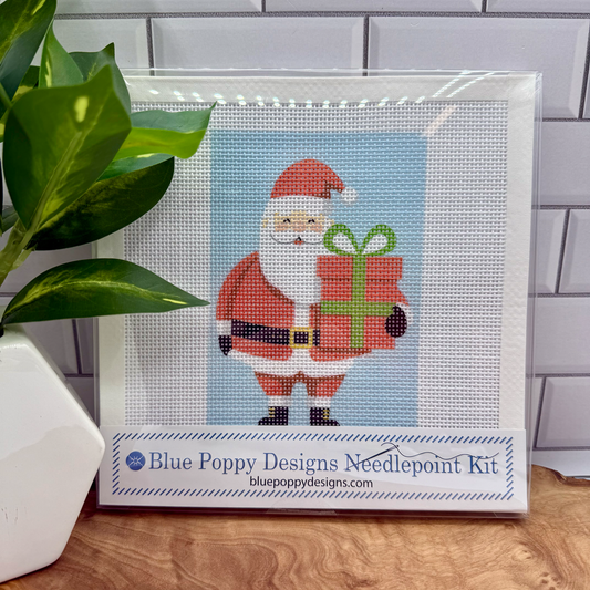 Christmas Santa Needlepoint Kit (holding present) needlepoint Blue Poppy Designs