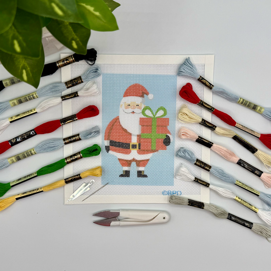 Christmas Santa Needlepoint Kit (holding present) needlepoint Blue Poppy Designs